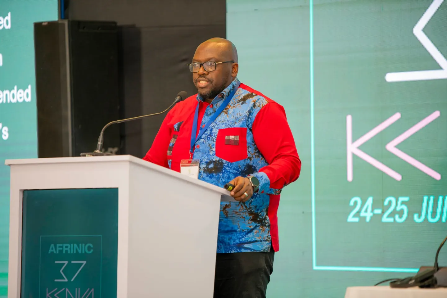 A speaker at the lectern at AFRINIC-37