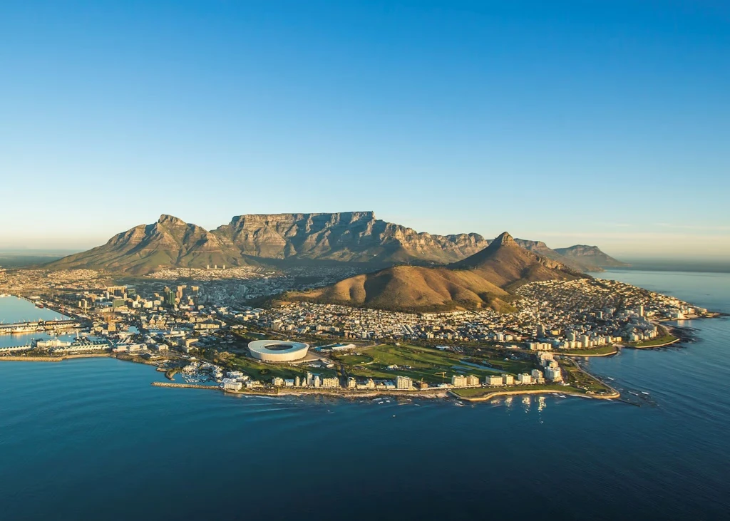 Aerial view of Cape Town with Table Mountain, Lion's Head and the Cape Town Stadium on the Atlantic shore